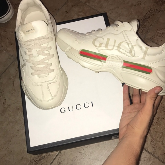 rhyton gucci logo leather sneaker on feet